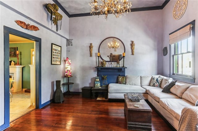 living room with ornamental molding, dark hardwood / wood-style flooring, and a fireplace