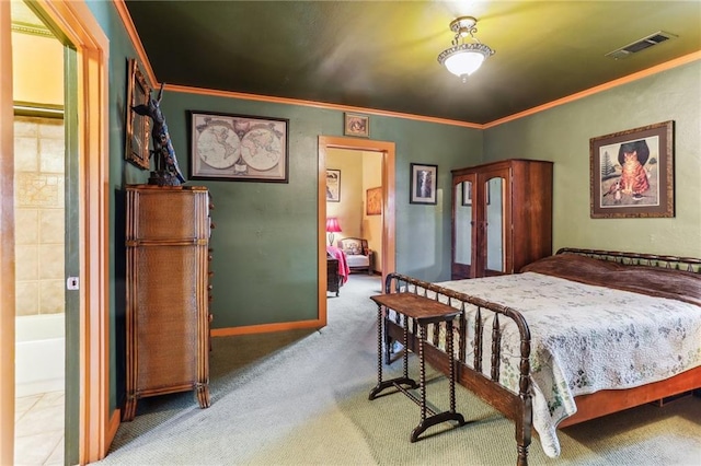 carpeted bedroom with ornamental molding