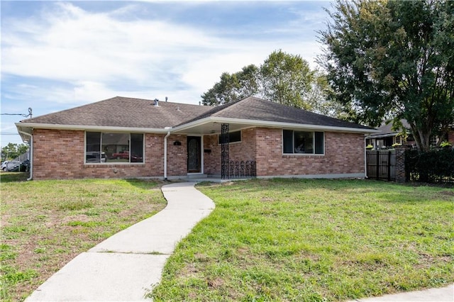 single story home with a front yard