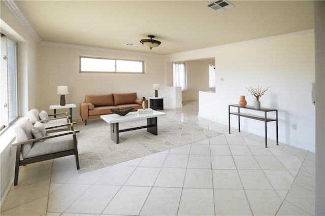 tiled living room featuring crown molding