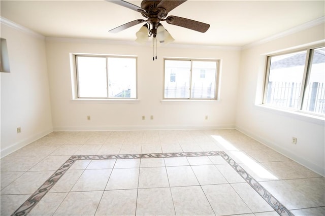 empty room featuring ornamental molding and a healthy amount of sunlight