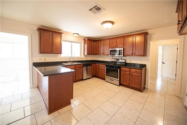 kitchen with ornamental molding, sink, appliances with stainless steel finishes, and light tile patterned floors