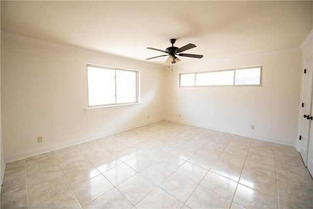 tiled empty room featuring crown molding and ceiling fan