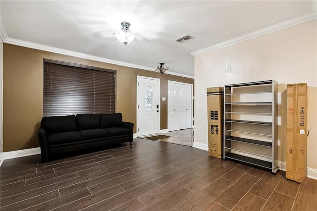 living room with dark wood-type flooring and crown molding