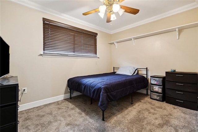 bedroom with ceiling fan, crown molding, and light colored carpet