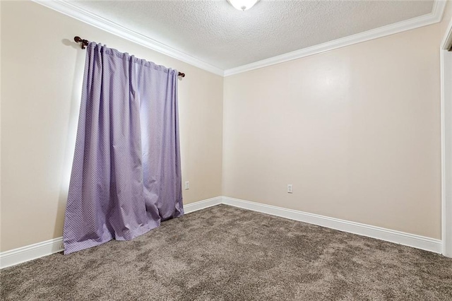 empty room featuring a textured ceiling, carpet flooring, and crown molding