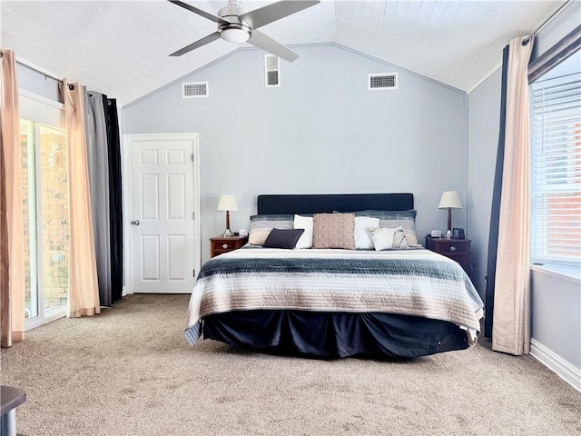 bedroom featuring vaulted ceiling, visible vents, and carpet floors