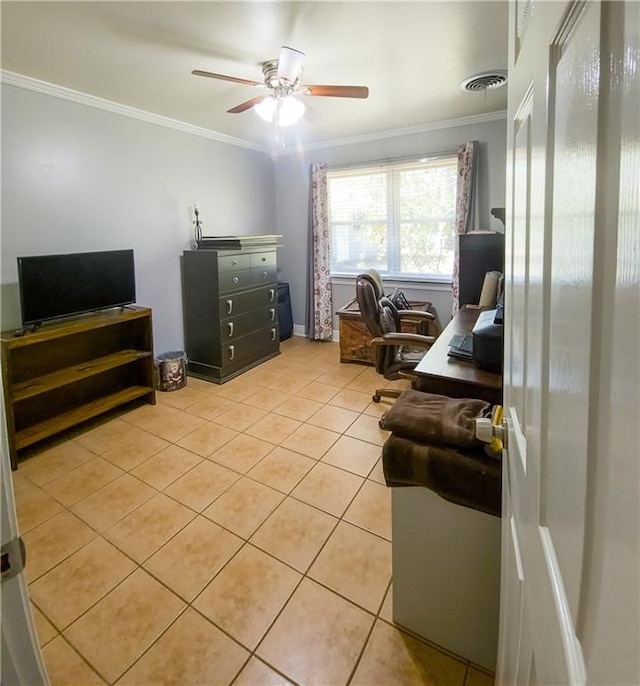 office space with crown molding, ceiling fan, and light tile patterned floors