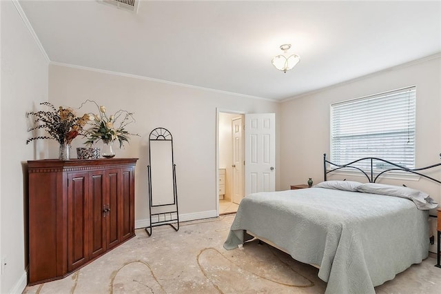 bedroom with connected bathroom and ornamental molding