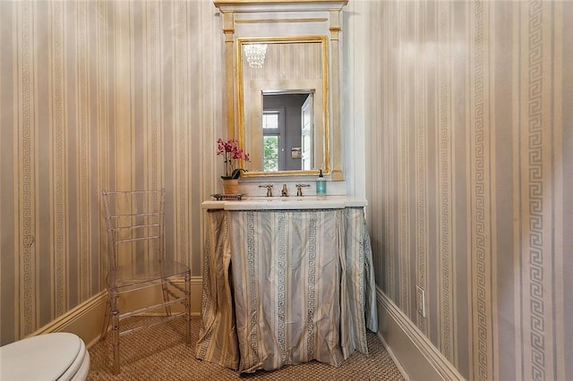 bathroom with vanity and toilet