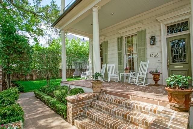 view of patio featuring a porch