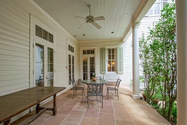 view of patio featuring ceiling fan