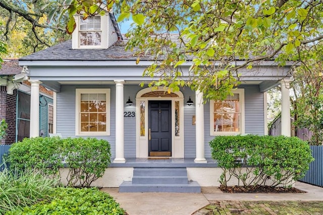 doorway to property with covered porch