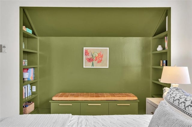 bedroom featuring lofted ceiling