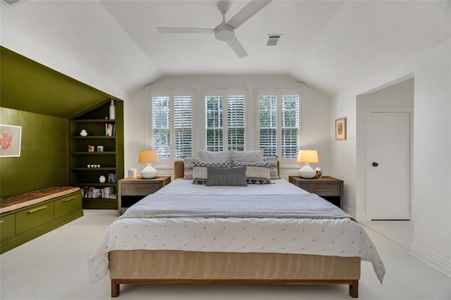 bedroom featuring ceiling fan, lofted ceiling, and light colored carpet