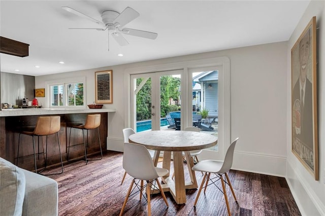 dining space with french doors, ceiling fan, wood-type flooring, and plenty of natural light