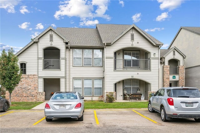 view of front of home with a balcony