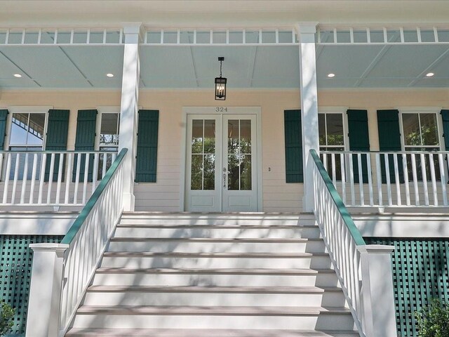 doorway to property with french doors and covered porch