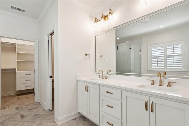 bathroom featuring vanity, crown molding, parquet floors, and walk in shower