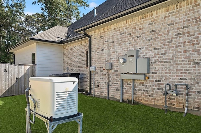 view of side of property with a lawn