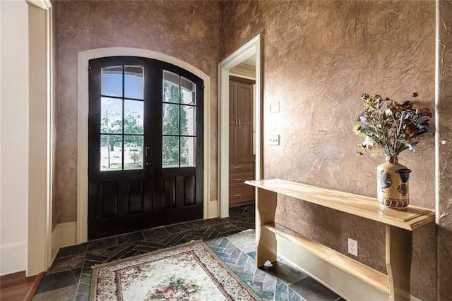 foyer featuring french doors