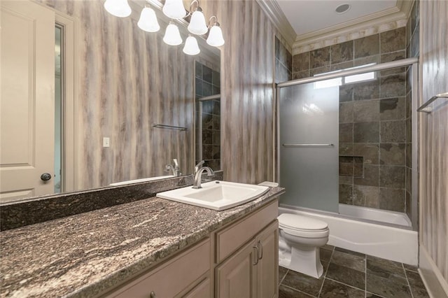 full bathroom with vanity, toilet, enclosed tub / shower combo, and ornamental molding