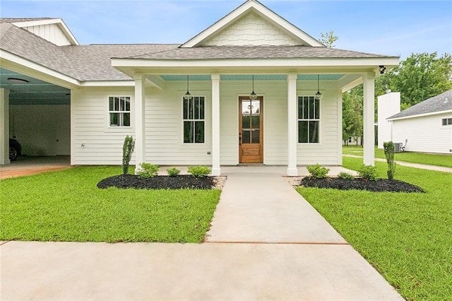 view of front of home with covered porch and a front yard