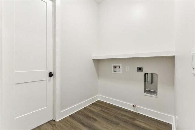 laundry room featuring gas dryer hookup, hookup for a washing machine, and dark hardwood / wood-style flooring