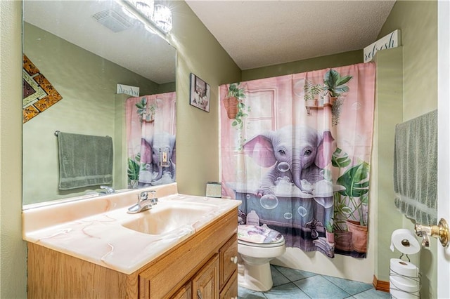 full bathroom with toilet, shower / tub combo with curtain, vanity, and tile patterned floors