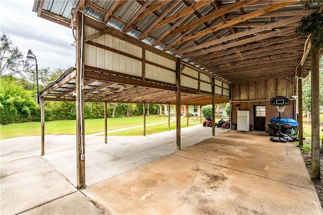 view of vehicle parking featuring a yard