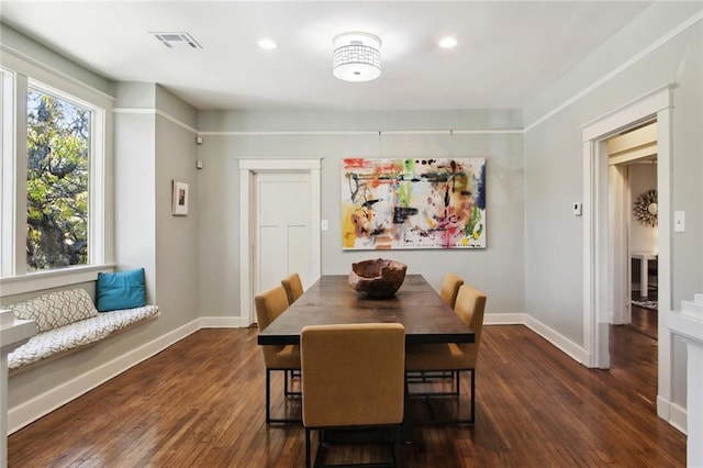 dining area with dark wood-type flooring