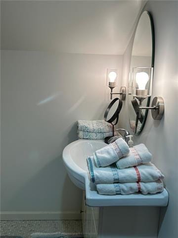 bathroom with tile patterned floors