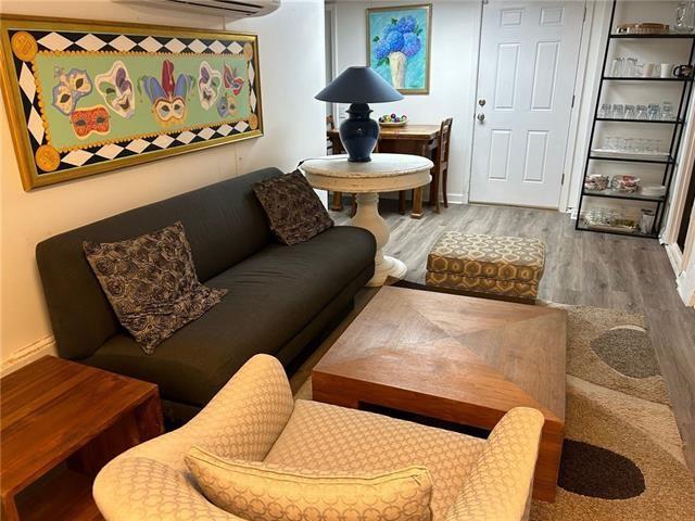 sitting room featuring hardwood / wood-style floors