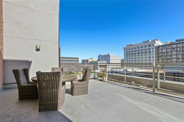 view of patio with a balcony