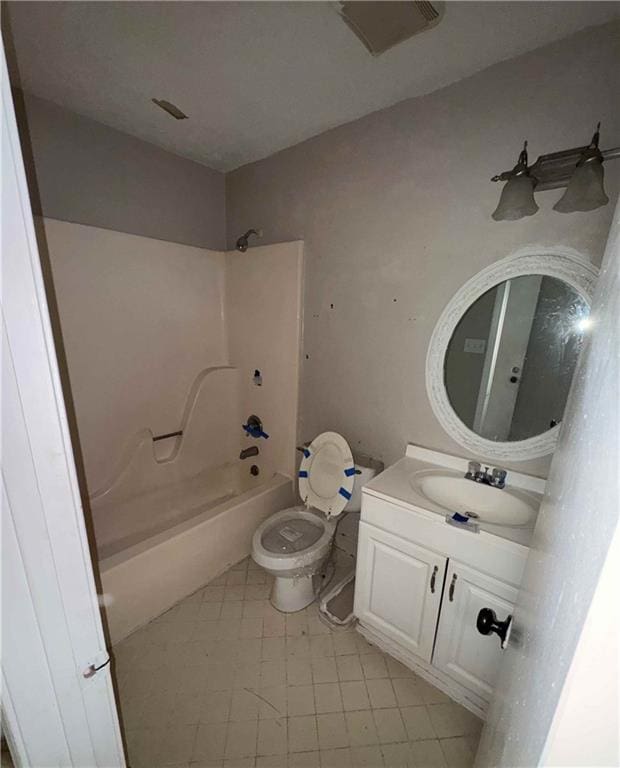 full bathroom with vanity, toilet, tile patterned flooring, and shower / bathtub combination