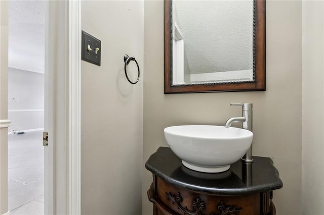 bathroom featuring vanity and tile patterned flooring