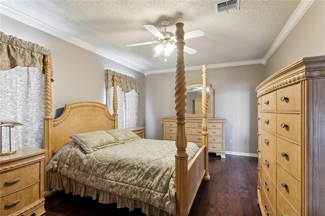 bedroom with ceiling fan, crown molding, a textured ceiling, and dark hardwood / wood-style flooring