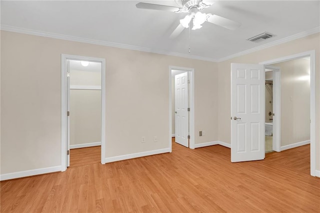 unfurnished bedroom with a spacious closet, light hardwood / wood-style flooring, ceiling fan, and ornamental molding