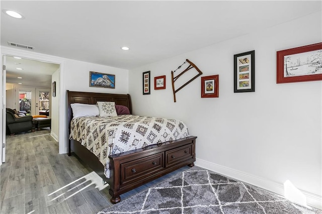 bedroom featuring hardwood / wood-style flooring