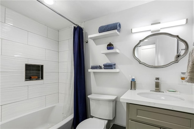 full bathroom featuring toilet, vanity, and shower / bathtub combination with curtain