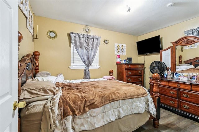 bedroom featuring hardwood / wood-style floors