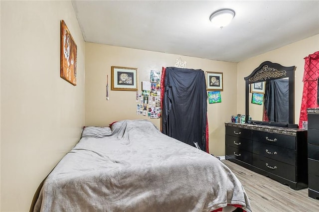 bedroom featuring light hardwood / wood-style floors