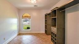 mudroom with light tile patterned floors