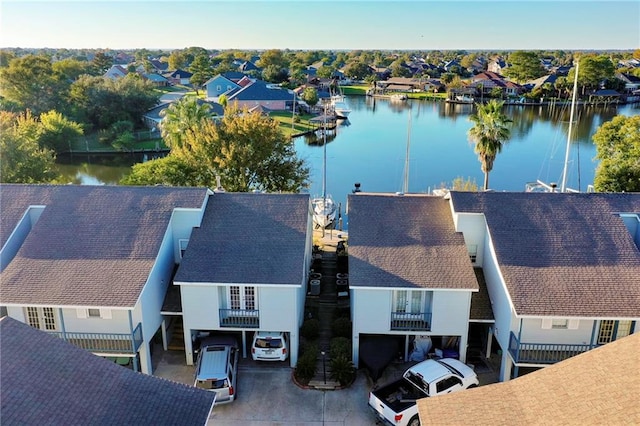 drone / aerial view with a water view