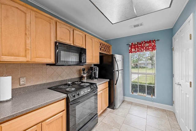 kitchen with backsplash, light brown cabinetry, light tile patterned floors, and black appliances