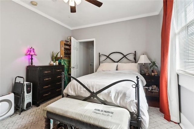 bedroom with ornamental molding and ceiling fan