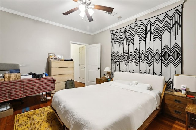 bedroom with ceiling fan, crown molding, and dark hardwood / wood-style flooring