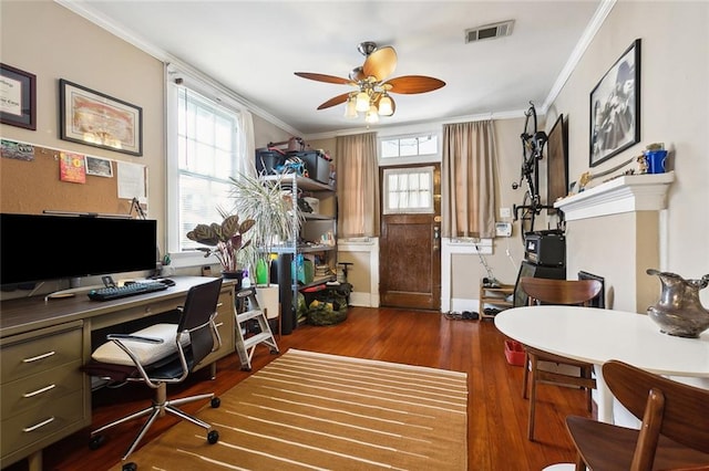 office area with ornamental molding, dark hardwood / wood-style flooring, and ceiling fan