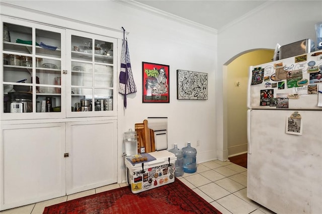 interior space with crown molding