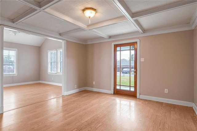 unfurnished room featuring coffered ceiling, beam ceiling, and light wood-type flooring